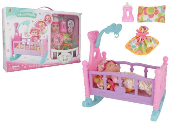 Bebé de goma con cuna y accesorios